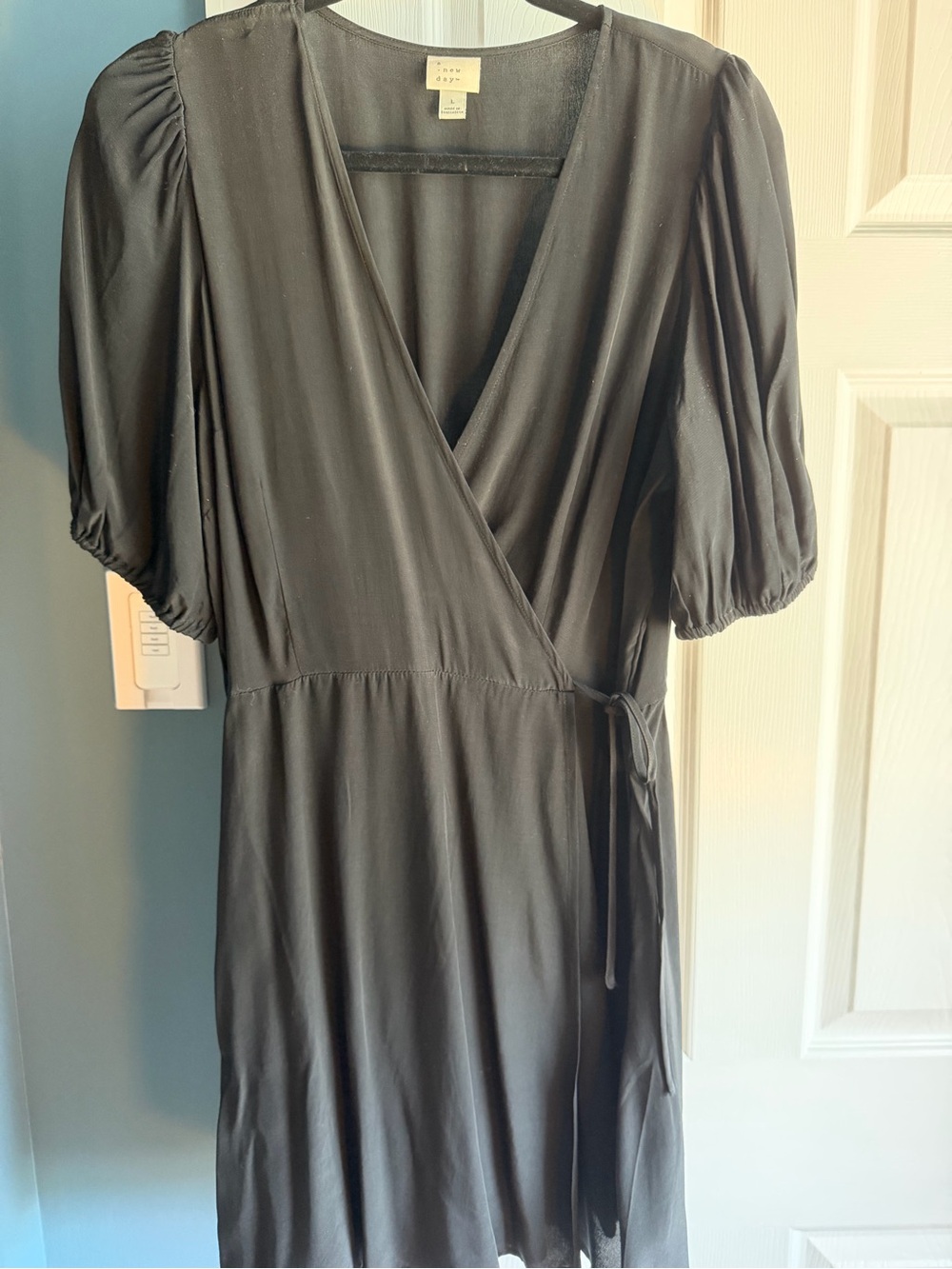 a new day black wrap dress with puff sleeves